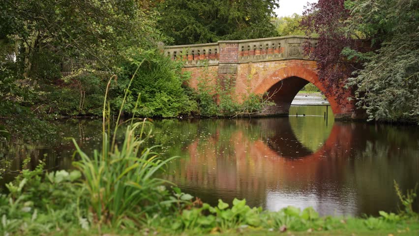 Canon Hill Park, Birmingham, red brick bridge.
Footbridge over the lake in Canon Hill Park.