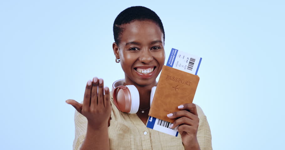 Woman, passport and plane ticket in studio for smile, come or welcome for travel with face by blue background. African person, documents and compliance with point, invitation or happy for immigration