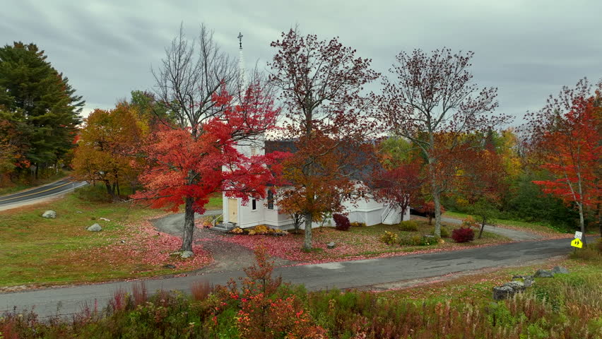 Autumn (Fall) foliage around a small chapel in New Hampshire.