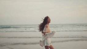 Happy asian woman running on sea beach, Slow motion, Smiling cheerful lady have fun on seashore enjoy beautiful nature. - Powered by Shutterstock - Get 15% off with code: PIKWIZARD15