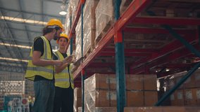 Man and woman workers checks products stock inventory with digital tablet in the retail warehouse full of shelves, Workers employee wearing hard hat doing work in storehouse. - Powered by Shutterstock - Get 15% off with code: PIKWIZARD15