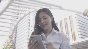 Enjoy social media, Asian women Using Social Media App on Smartphone while standing in the city. - Powered by Shutterstock - Get 15% off with code: PIKWIZARD15