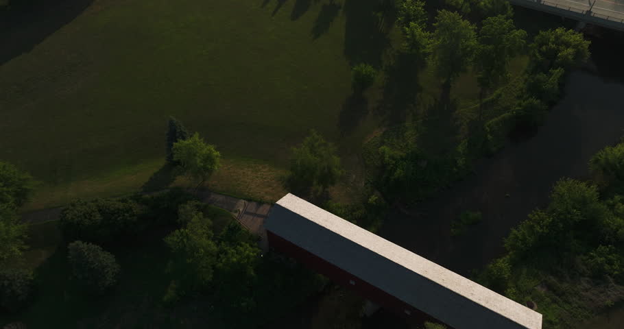 Aerial View Of Zumbrota Covered Bridge In Covered Bridge Park, Zumbrota, Minnesota, USA. pullback