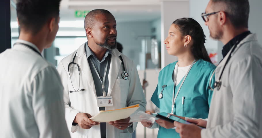 Doctors, nurses and team planning, hospital management and workflow discussion for schedule, advice or services. Healthcare worker, mentor and people with medical documents, clinic files and meeting Royalty-Free Stock Footage #1109480669