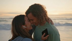 Enamoured woman man dancing on sundown beach. Romantic playful couple listening music hugging at sea shore. Happy girl and guy expressing feelings to each other. Young lovers spending time together - Powered by Shutterstock - Get 15% off with code: PIKWIZARD15