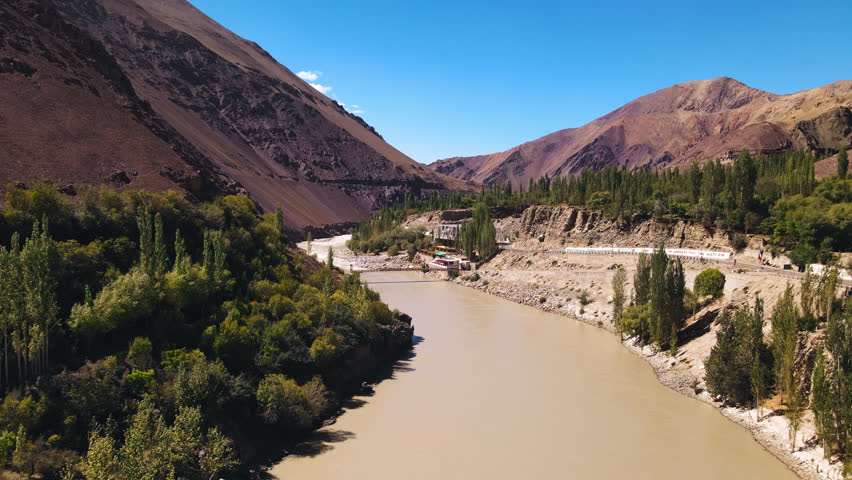 A Confluence of the Indus and Zanskar Rivers. Aerial view of beautiful river and mountain. Tourist attractions in Leh, Ladakh, India. Ladakh