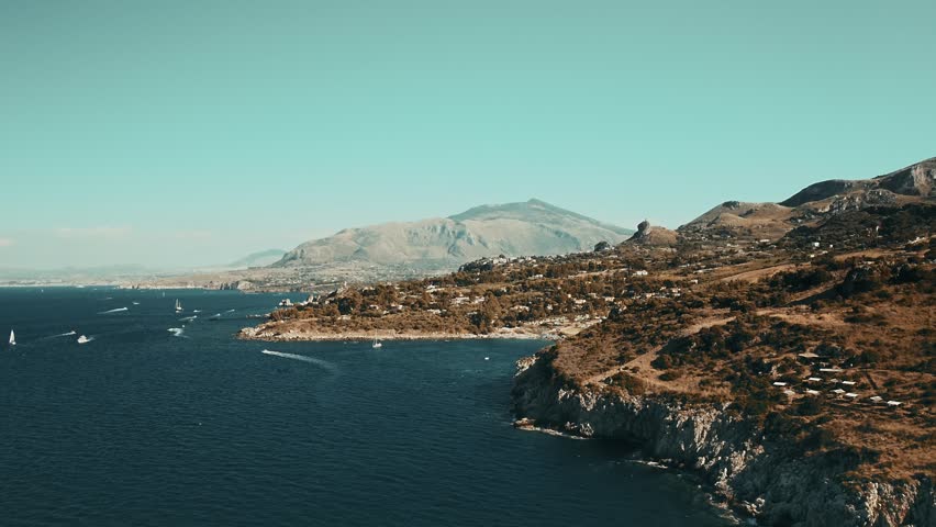 Aerial drone view over the beautiful natural reserve of the Zingaro near San Vito Lo Capo in the province of Trapani Royalty-Free Stock Footage #1109488589