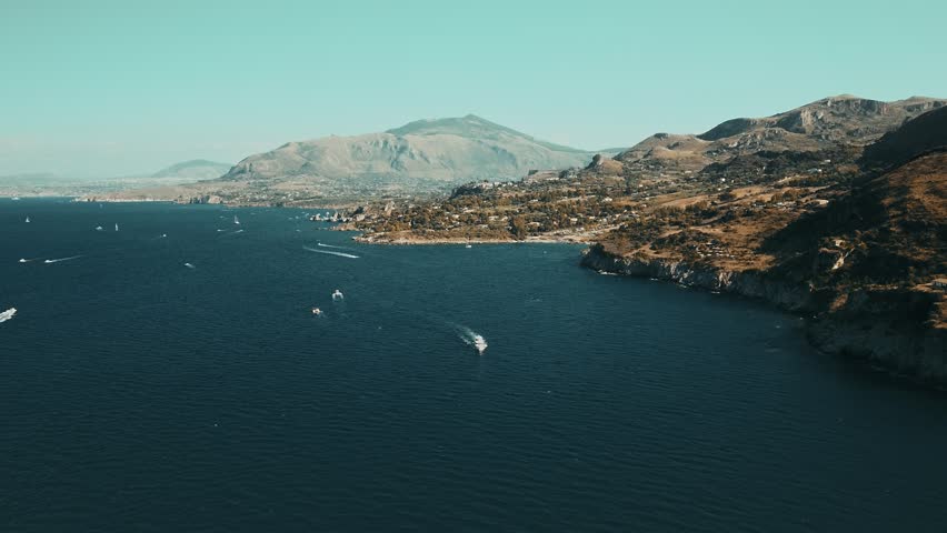 Aerial drone view over the beautiful natural reserve of the Zingaro near San Vito Lo Capo in the province of Trapani Royalty-Free Stock Footage #1109488645
