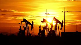 Sunset oil industry in the field at Thailand - Powered by Shutterstock - Get 15% off with code: PIKWIZARD15