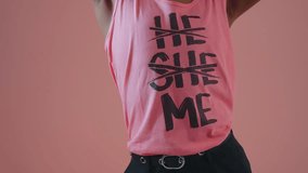 Gender fluid young man wearing fashionable clothes posing in studio on colored backgrounds - Powered by Shutterstock - Get 15% off with code: PIKWIZARD15