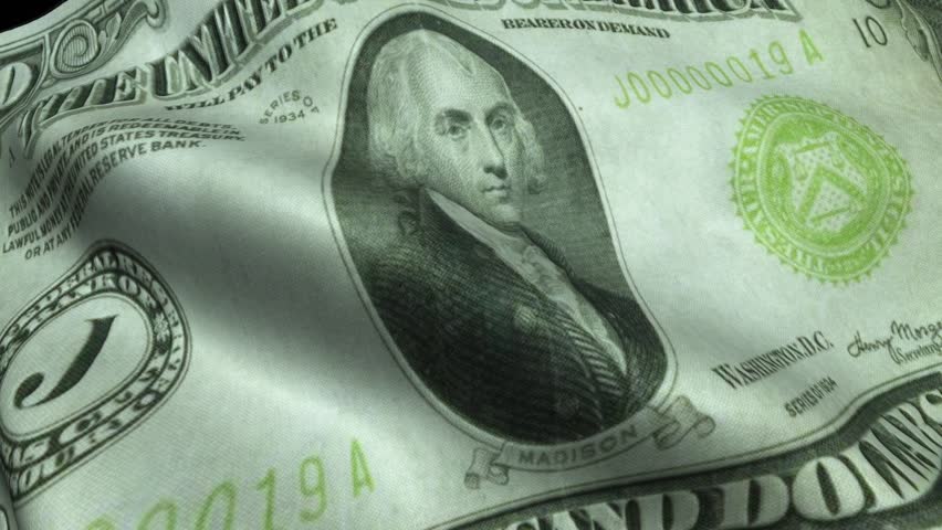 Close Up Of The 5000 Dollar Bill Waving Like A Flag