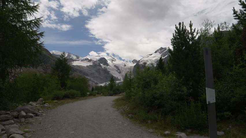 Morteratsch Valley with Morteratsch Glacier - 1960 Mark - Wide Shot | Shutterstock HD Video #1109495151