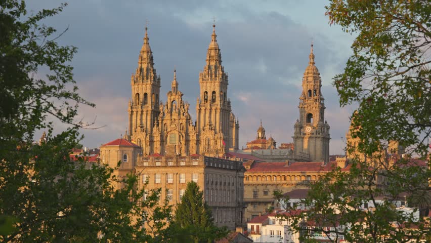 Gimbal shot of Santiago de Compostela Cathedral at sunset. Final point of pilgrims walking path of the Camino de Santiago. Santiago de Compostela, Spain Royalty-Free Stock Footage #1109505577