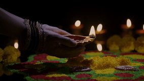 Clay diya lamps lit during diwali celebration, Diwali, or Deepavali, is India's biggest and most important holiday. - Powered by Shutterstock - Get 15% off with code: PIKWIZARD15