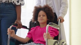 little girl sitting on wheelchair and doctor taking care her in the hospital - Powered by Shutterstock - Get 15% off with code: PIKWIZARD15