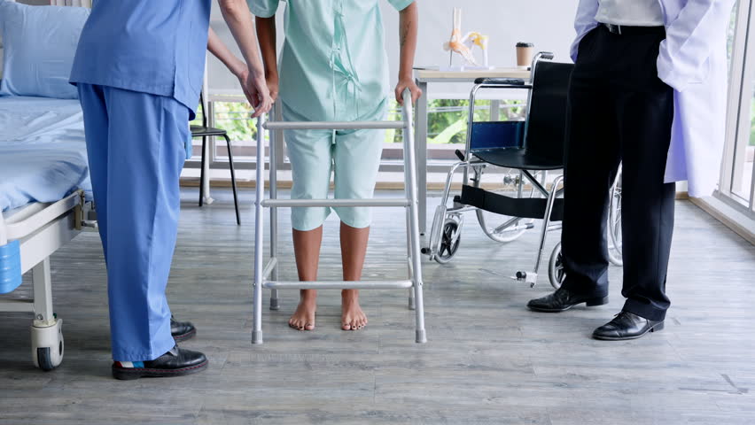Anonymous female patient's leg Currently using a walker Learn to walk slowly. According to the advice of an orthopedic specialist. and physical therapist To test the strength of both legs Royalty-Free Stock Footage #1109507815