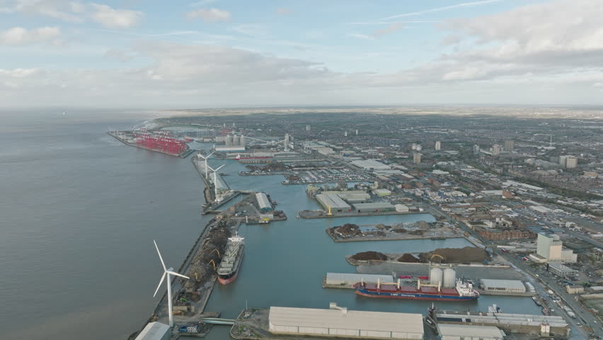 Aerial view of Liverpool's vibrant port, the hub of trade, on a bright day Royalty-Free Stock Footage #1109513421