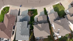 Aerial video of Arbor Creek, Saskatoon, SK, Canada, showcasing the harmonious blend of residential structures and green spaces. Perfect for urban design visuals.
