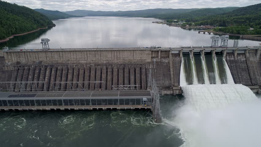 Aerial view of water discharge at hydroelectric power plant