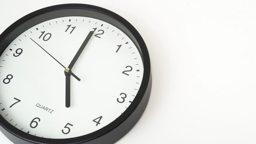 A clock reaching 5 o'clock. Royalty-Free Stock Footage #1109525695