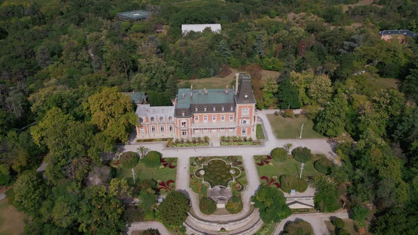 Aerial view of the historic Euxinograd palace in Varna, Bulgaria. Admire the grand architecture and lush gardens of this magnificent estate, situated along the beautiful Black Sea coast. Royalty-Free Stock Footage #1109538323