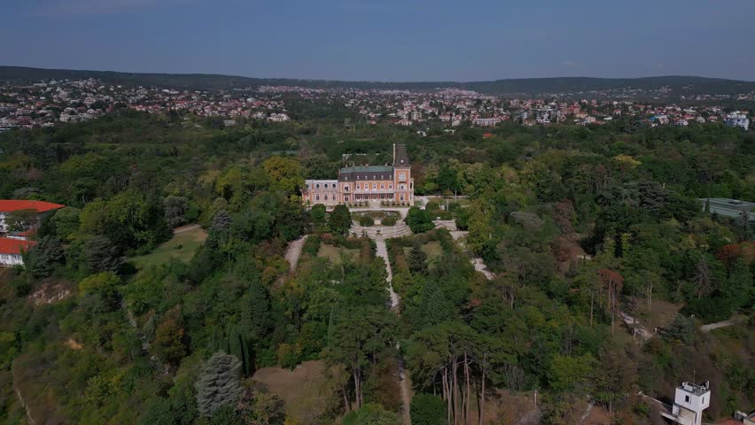 Aerial view of the historic Euxinograd palace in Varna, Bulgaria. Admire the grand architecture and lush gardens of this magnificent estate, situated along the beautiful Black Sea coast. Royalty-Free Stock Footage #1109538325