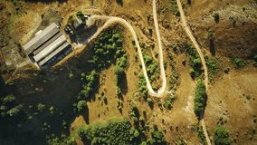 drone view of a winding dirt road in the countryside. Italy Abruzzo. - Powered by Shutterstock - Get 15% off with code: PIKWIZARD15