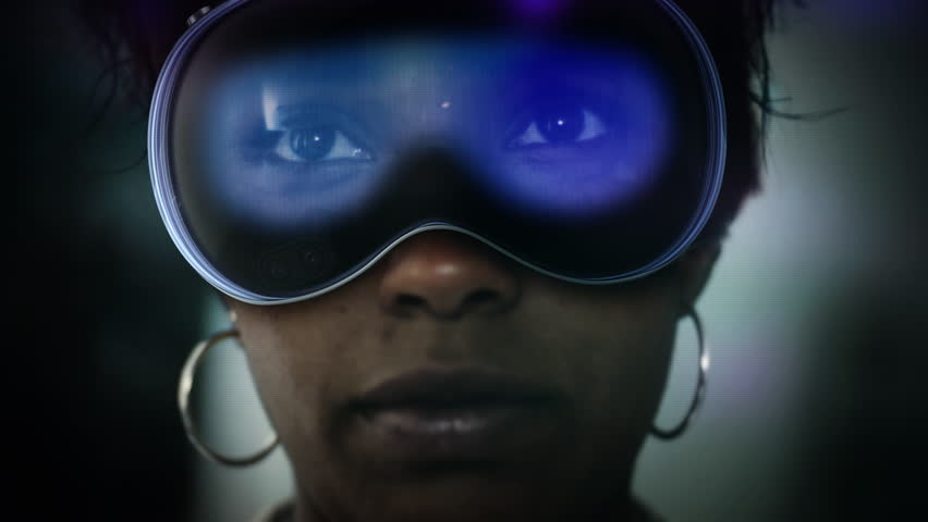 Young Female African American Using VR Headset to Check Social Media Videos. Augmented Reality. Several Videos Appearing. Futuristic Virtual Reality. All Content included in my portfolio. Royalty-Free Stock Footage #1109547269