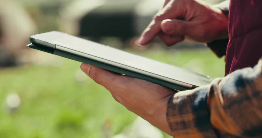 Person, farmer or hands on tablet for planning agriculture growth, harvest or poultry livestock research in nature. Closeup, technology or chicken farm worker in digital quality control or inspection