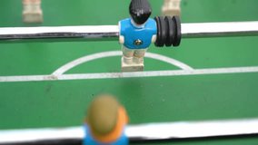 Close-up of figures of plastic players in a football match. - Powered by Shutterstock - Get 15% off with code: PIKWIZARD15