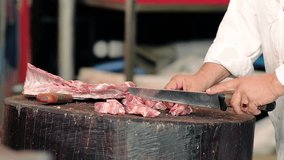 Close-Up Butcher Cuts Meat On Skewers