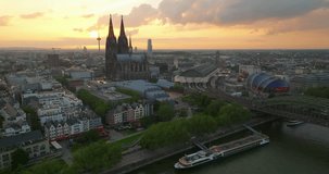 Establishing shot of cityscape of Cologne, modern European city on river Rhine - landscape panorama of Germany from above, Europe. Aerial drone video footage Famous Cologne Cathedral