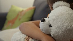 Girl holding a white teddy bear - Powered by Shutterstock - Get 15% off with code: PIKWIZARD15