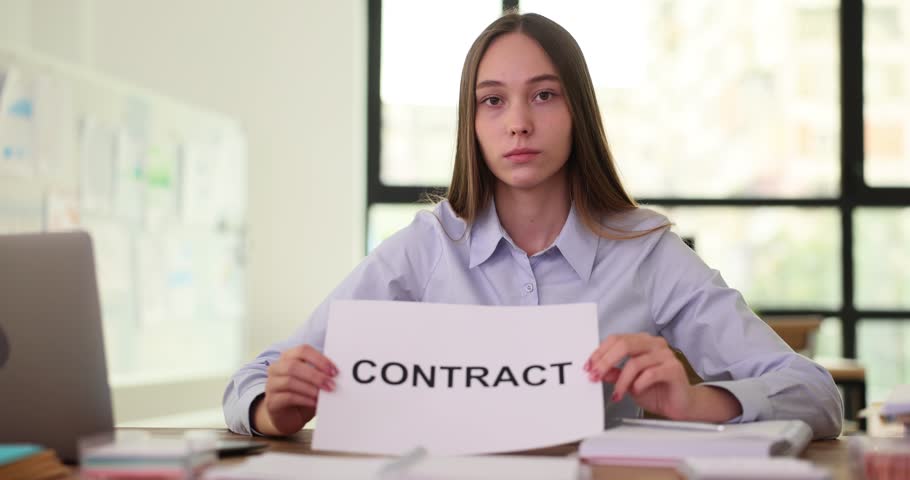 Hands of businesswoman trainee holding contract document for employment in office. Business contract Royalty-Free Stock Footage #1109590453