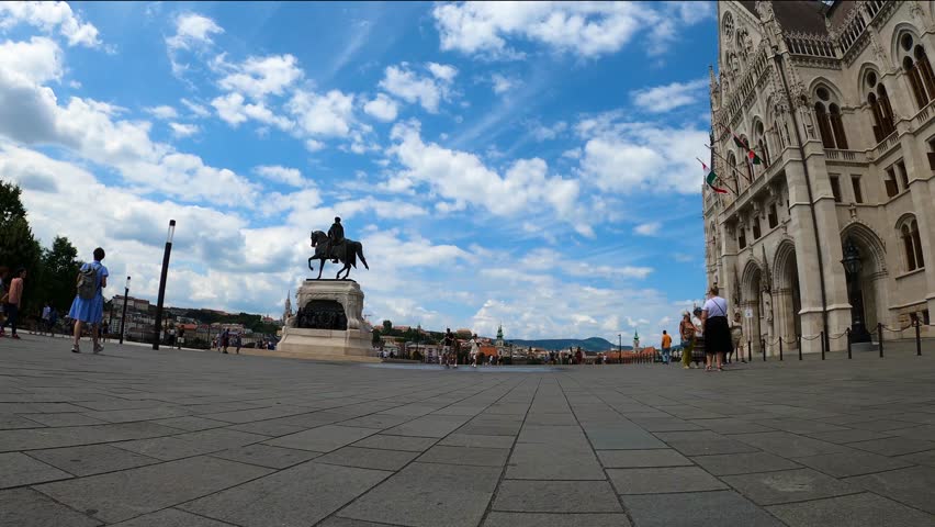 BUDAPEST, HUNGARY - JULY 7, 2023: Hungarian Parliament at daytime. Budapest. One of the most beautiful buildings in the Hungarian capital. Budapest, Hungary on July 7, 2023