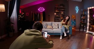 Asian girl recording video of trending hip hop dance challenge for likes and followers on social media platform. Vlogger influencer Asia trending moving dance reel shorts 