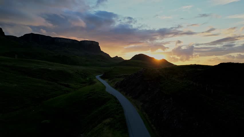 Sunset Sky At Rural Landscape Countryside Scenery. Sunset Outdoor Rural Sky Panorama on Isle of Skye,Scotland