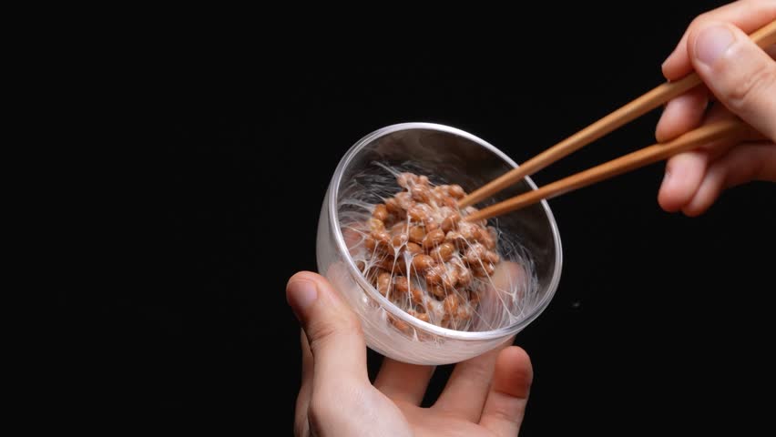 Video of mixing NATTO well on a black background.
4K 120fps edited to 30fps Royalty-Free Stock Footage #1109608229