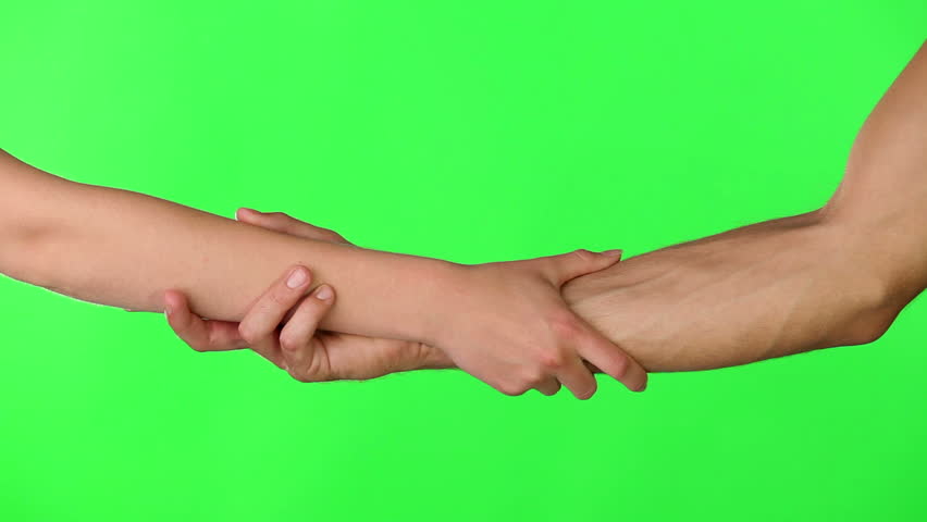 Arm, hold and green screen for teamwork partnership collaboration, trust or community support. Forearm, hands and link respect agreement or together strong hope, cooperation or solidarity help mockup
