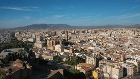 Aerial 4K video from drone to the city of Malaga and old town Malaga at sunrise. Malaga,Costa del sol, Andalusia,Spain, (Series)
