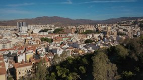 Aerial 4K video from drone to the city of Malaga and old town Malaga at sunrise. Malaga,Costa del sol, Andalusia,Spain, (Series)