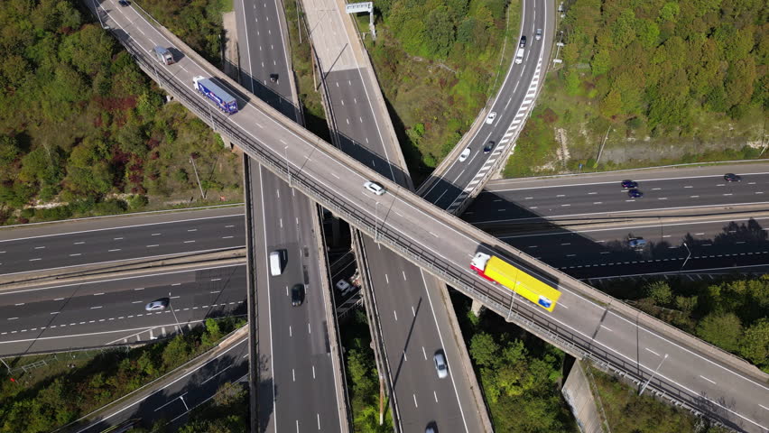Aerial view of the junction of the M25 and M1 motorways. Royalty-Free Stock Footage #1109613097