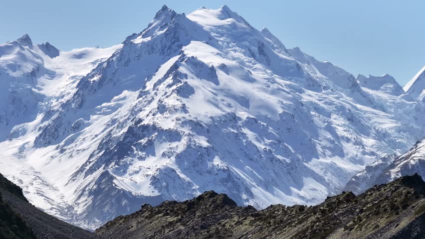 Beautiful view of snow capped mountain peak. Mount Cook National Park, New Zealand. Winter scenery.