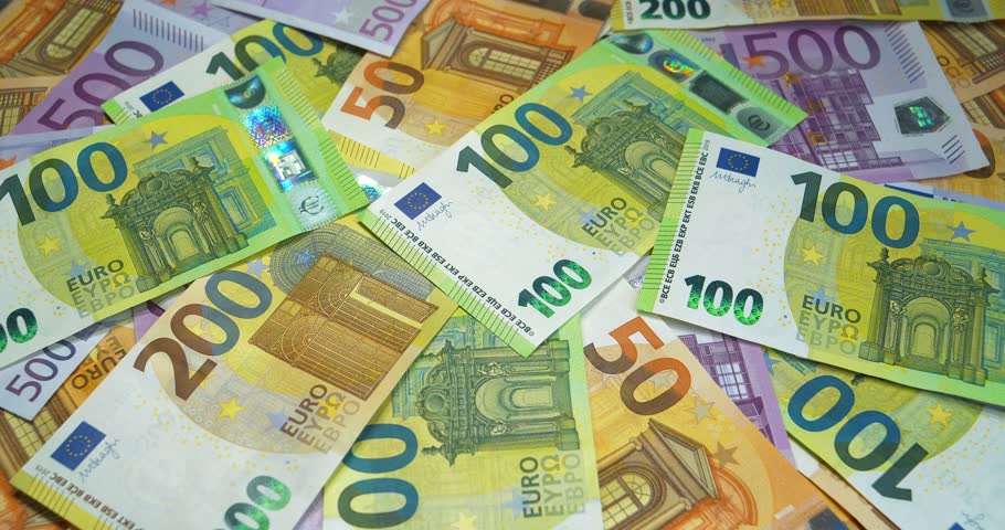 Rotating Euro banknotes of various denominations. Banknotes 500, 200, 100 and 50 Euro. Real euro money of various colors and nominals. Cinema 4K 60fps video with darkening Royalty-Free Stock Footage #1109616525
