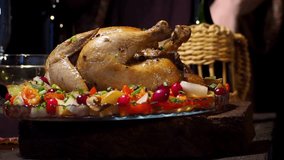 carving Traditional Roasted Christmas turkey for Holiday Dinner eating and holidays concept footage