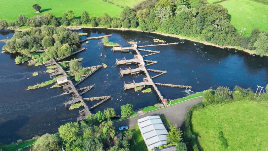 Aerial video of The River Bann from Lough Neagh at Portna Lock Kilrea County Derry Antrim Northern Ireland