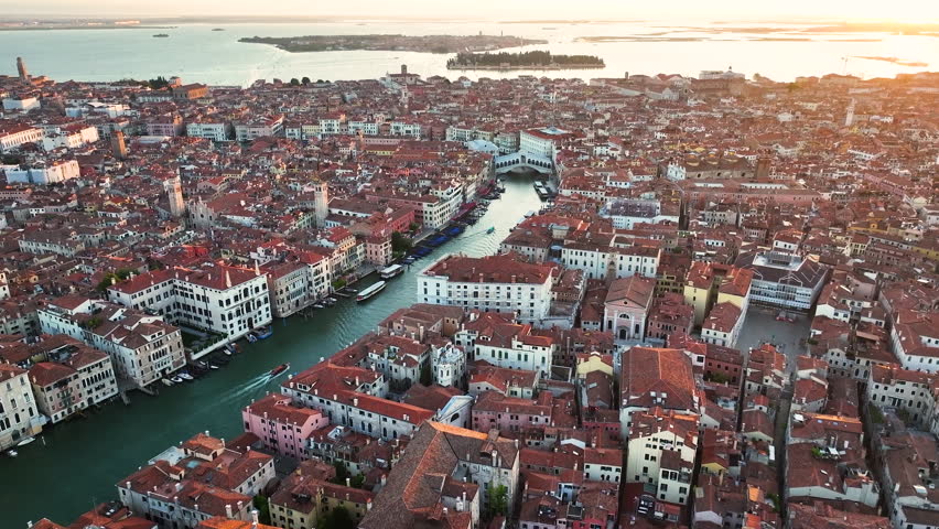 Sunrise over Venice, aerial view shot of Rialto Bridge over Grand Canal, Venetian Lagoon, Italy Royalty-Free Stock Footage #1109640467