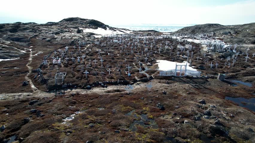 Historical landmark and tourist attraction of Ilulissat Cemetery in Western Greenland. Aerial birds eye.