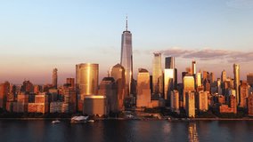 Establishing Aerial View Shot of New York City NY, NYC, United States, superb colors of sunset, downtown manhattan, circling right, part 2