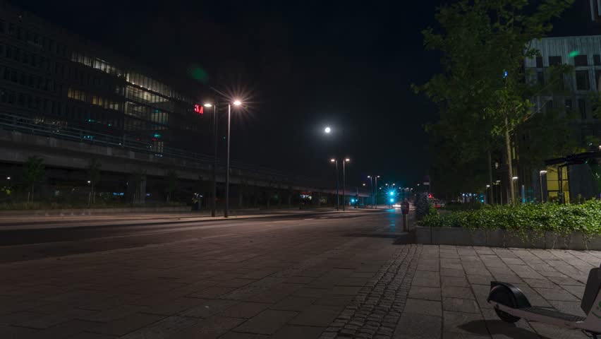 A beautiful timelapse shot of cars on a road at night in Copenhagen, Denmark